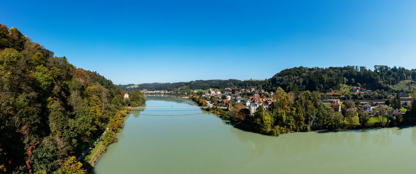 Austria, Upper Austria, Wernstein am Inn, Panoramic view of river Inn in summer with Mariensteg bridge in background