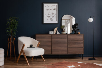 Stylish compositon of elegant living room interior design with fluffy armchair, wooden commode, mock up poster frame and modern home accessories. Blue wall. Home staging. Template. Copy space.