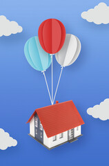 Balloons carrying a house