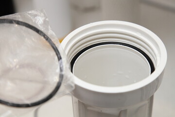 New rubber O ring sealing replace on water filter box when maintenance service