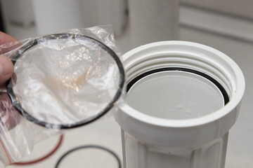 New O-ring sealing replace on water filter box maintenance service