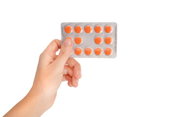 Female Hand Holding Tablet Of Pills, Isolated On White Background