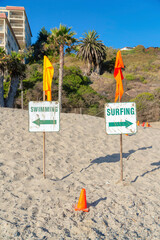 Surfing and swimming signboard at the beach in San Clemente, California