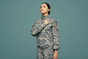 Army soldier swearing an oath in a studio