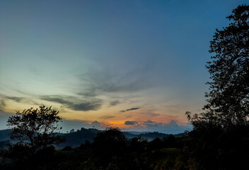 The sky of sunrise in the forest mountains of Borneo 