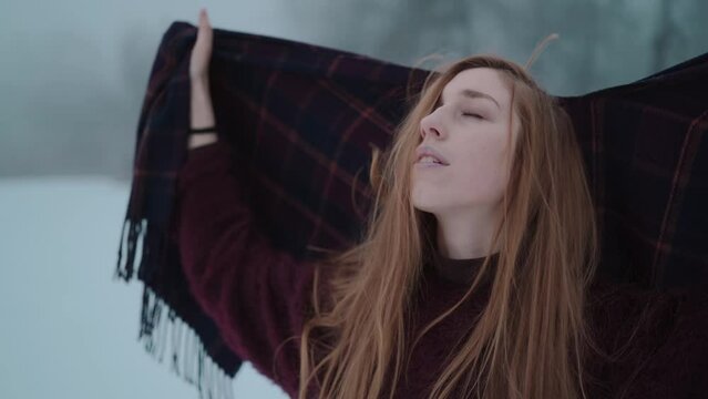 A Girl enjoying the snow landscape on the ice lake