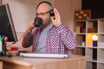 Man working remotely from home having conference call