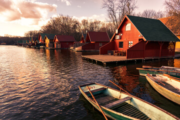 Derítő to lake in Tata Hungary with cute colorful fishing cabins