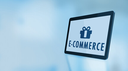Gift Pack Symbol and E-Commerce Text On A Digital Tablet Screen