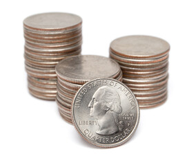 Stacks of US Quarters on white background