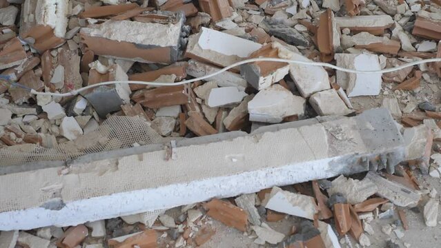 Pile of construction waste after lintel removal in an apartment during remodeling