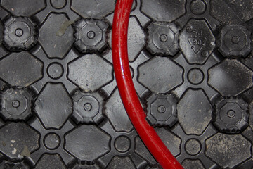 underfloor heating pipes.Red pipes of a warm water floor are laid and fixed on special panels for warm floors