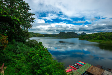 panoramic background of high mountain scenery, overlooking the atmosphere of the sea, trees and...