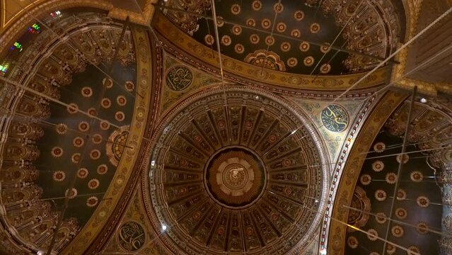 Mosque of Muhammad Ali interior illuminated ceiling with painting of Arab muslim patterns