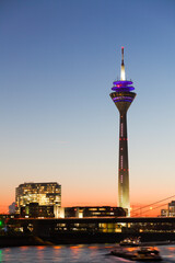 Rhine, Parliament and Rheinturm at dusk, Dusseldorf, NRW, Germany