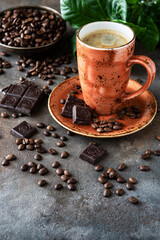 Ceramic cup of coffee   on dark background