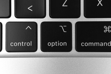 Option key and button on keyboard. Option sign close-up. Modern laptop, communication concept photo