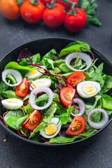salad quail egg tomato mix leaves vegetable healthy meal food snack on the table copy space food background keto or paleo diet veggie vegan or vegetarian food