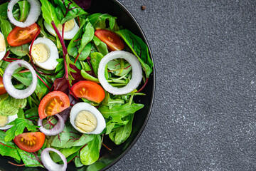 salad quail egg tomato mix leaves vegetable healthy meal food snack on the table copy space food background keto or paleo diet veggie vegan or vegetarian food