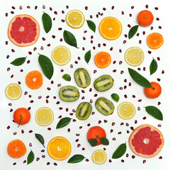 Set from fresh fruits . Fresh slices lemons,mandarins, oranges, grapefruits ,kiwi ,pomegranate seeds isolated on a white background . Healthy food photo . Flat lay , top view