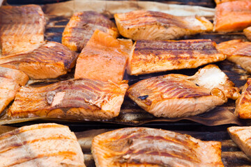 Fillet of red fish fried on a grill closeup.