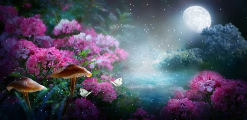 Gordijnen Fantasy magical fairy tale landscape with enchanted forest lake, fabulous fairytale blooming pink rose flower garden, mushrooms and two butterflies on mysterious background and glowing moon in night. © julia_arda
