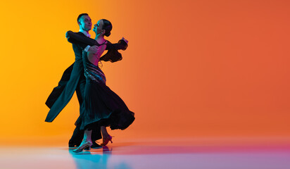 Flyer with dancing couple, beautiful man and woman dancing waltz isolated over gradient orange pink background in neon light. Beauty, art, sport concept