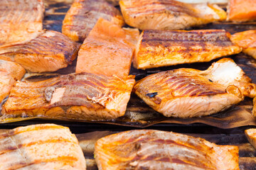 Fillet of red fish fried on a grill closeup.