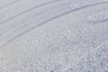 Obraz premium hoarfrosted metal surface in winter sunny day