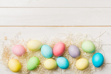 holiday preparation Multi colors Easter eggs on colored background . Pastel color Easter eggs. holiday concept with copy space