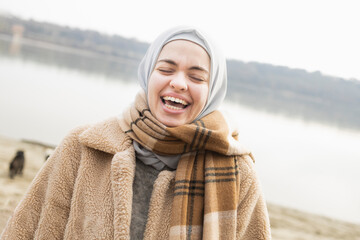 Woman laughing at a funny joke