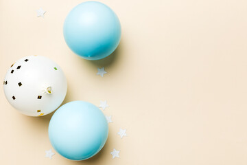 Background with fastive air balloons of round shape and confetti, multicoloured top view. Birthday party background