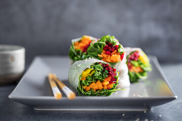 Rice paper roll with vegetables on plate