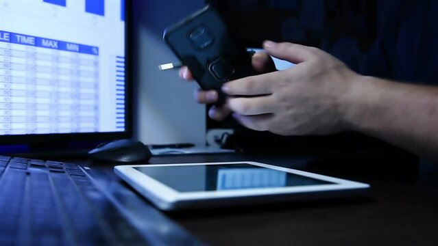 Close Up Of Businessman Using Tablet Computer With Spreadsheet Reports. Business, Financial And Analyzing Concept.