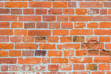 Naklejka premium Old wall of red bricks for the background