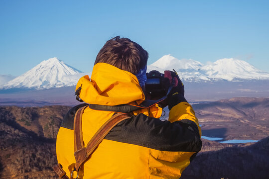 The guy takes pictures of volcanoes in Kamchatka