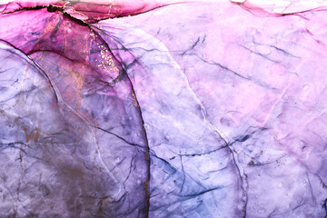 Luxury abstract background in alcohol ink technique, purple gold liquid painting, scattered acrylic...