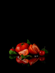 Red tomato vegetable in a bowl on a table food photography. Organic agriculture tomato vegetable vitamins on a table copy space banner.