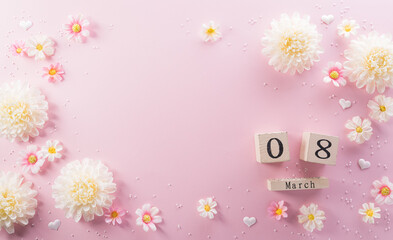 Obraz na płótnie Canvas Happy Women's Day decoration concept made from flower and wooden calendar on pink pastel background.