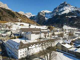 Fototapeta na wymiar Drone view at the Benedictine convent of Engelberg in the Swiss alps