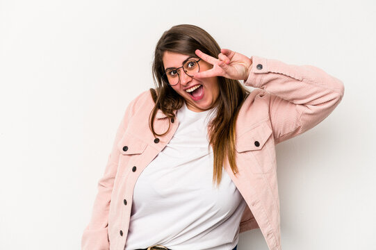 Young Caucasian Overweight Woman Isolated On White Background Dancing And Having Fun.