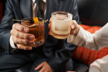 Fragment photo of people cheering with delicious drinks