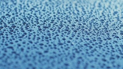 Crystal Clear Drops of Pure Rain Water on Flat Glossy Waterproof Hydrophobic Surface 