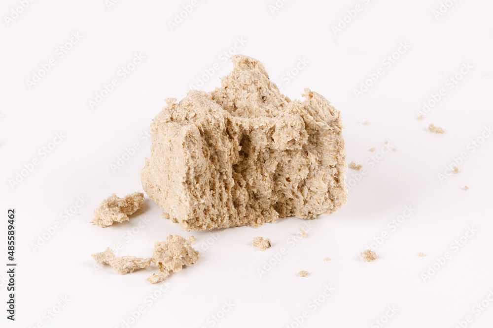 Poster halva with crumbs on white background