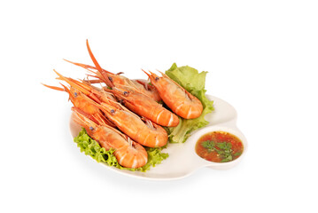 grilled shrimp on a plate served with spicy sauce