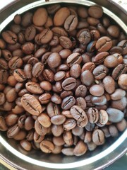 Brown coffee beans in the jar