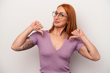 Young caucasian woman isolated on white background feels proud and self confident, example to follow.