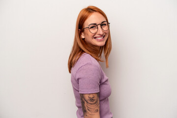 Young caucasian woman isolated on white background confident keeping hands on hips.