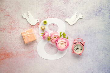 Pink ranunculus decorates the number eight and white doves on pastel background. Greeting Card...