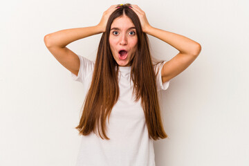 Fototapeta premium Young caucasian woman isolated on white background surprised and shocked.